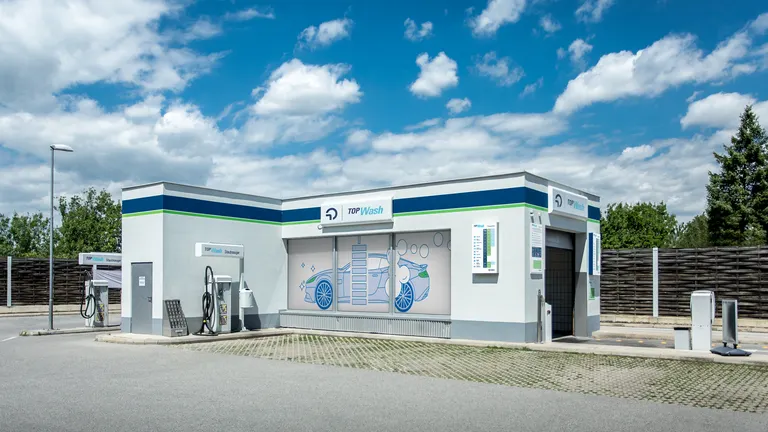 Man looking at an OMV TopWash Care Care Product