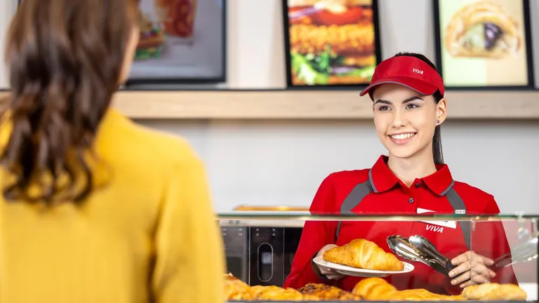 Filling station employee woman