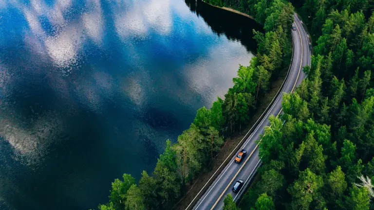 2 cars and lake